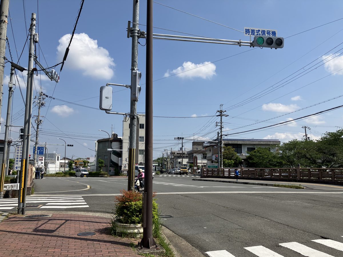 Traffic light and crosswalk in front of Omiya Bridge