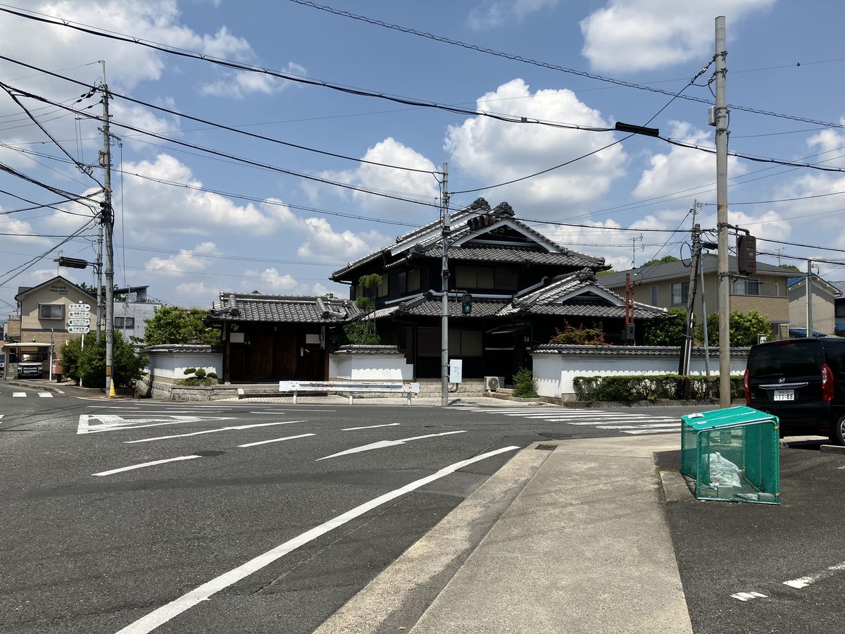 A pedestrian crossing just after turning right at the intersection